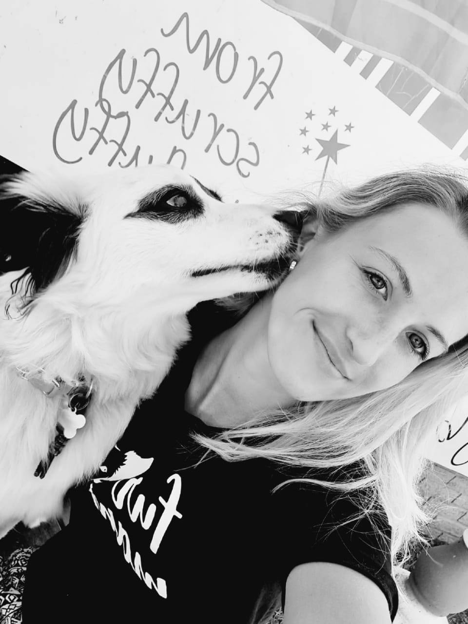 Sanchia, owner of Paws on Route, with a dog